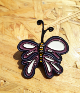 "PIN EMPRESARIAL PERSONALIZADO TRIDIMENSIONAL FUNDIDO."