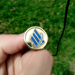 "PIN EMPRESARIAL PERSONALIZADO TRIDIMENSIONAL FUNDIDO."