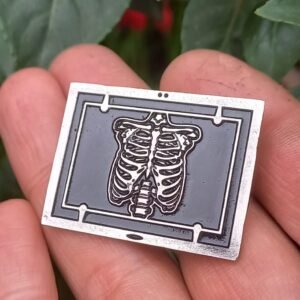 "PIN EMPRESARIAL PERSONALIZADO TRIDIMENSIONAL FUNDIDO."