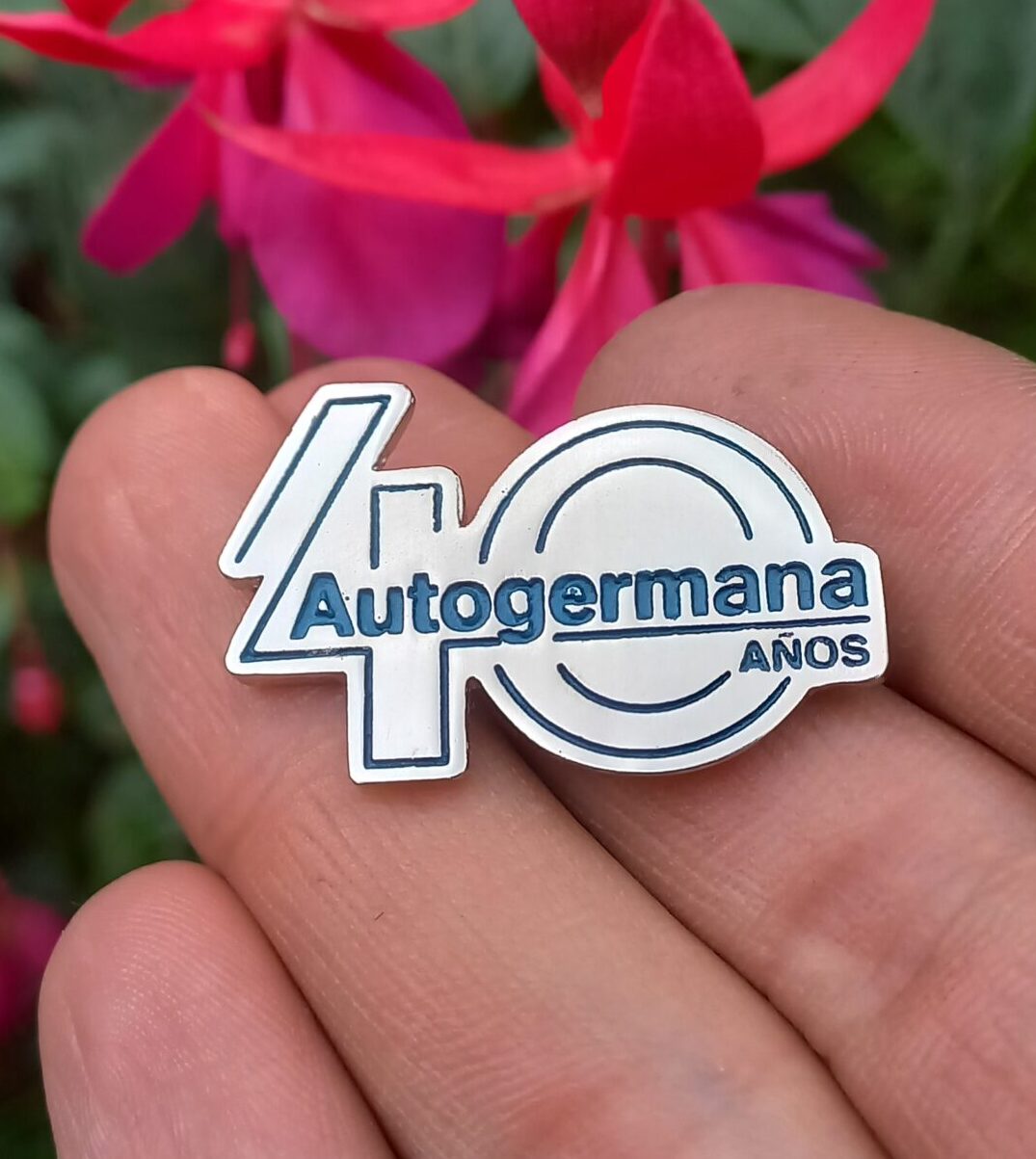 "PIN EMPRESARIAL PERSONALIZADO TRIDIMENSIONAL FUNDIDO."